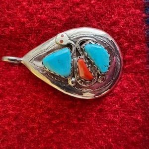 Snake (SS) pendant by Zuni artist Effie with turquoise and coral.